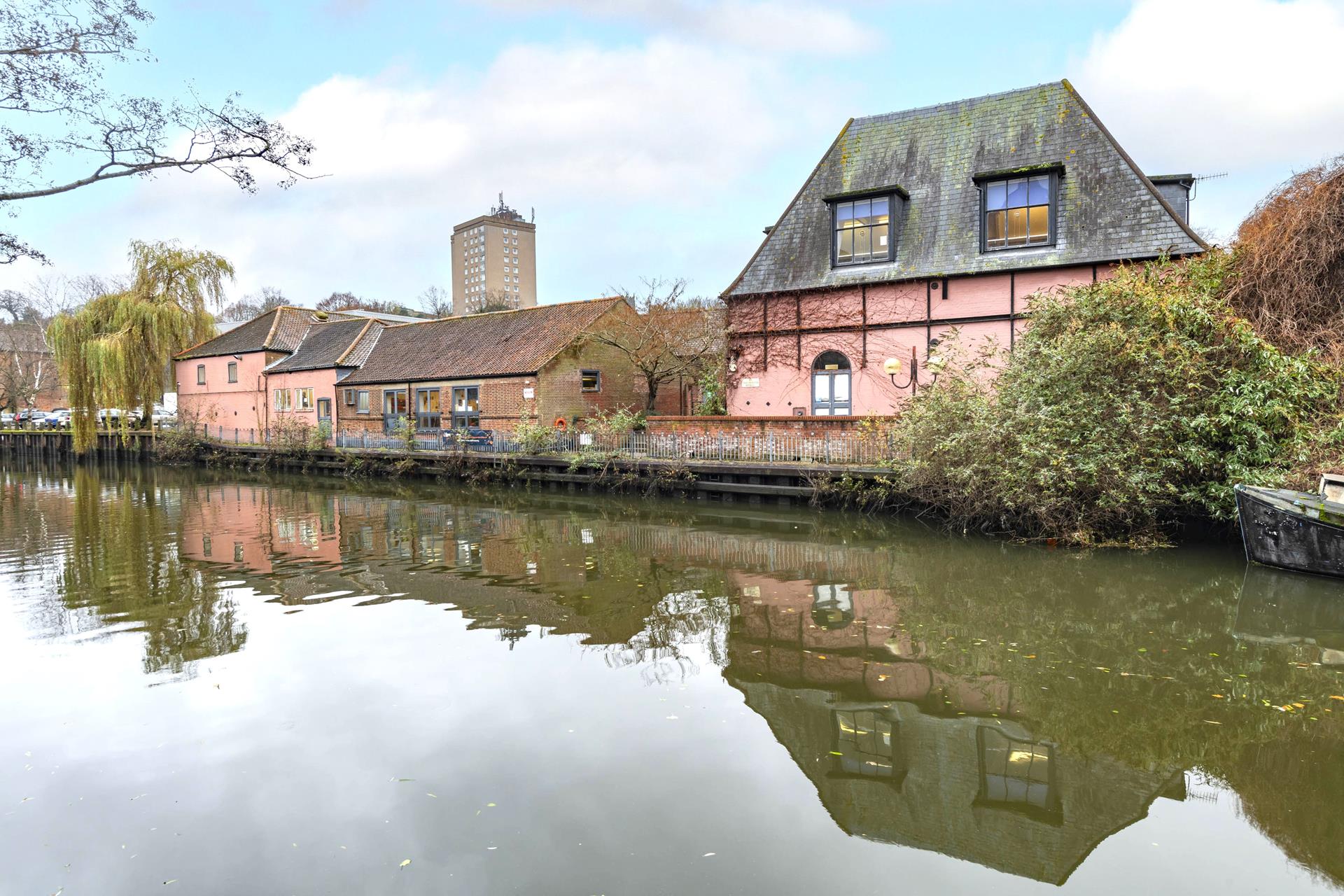Rare opportunity for investor as riverside site with four historic buildings for sale